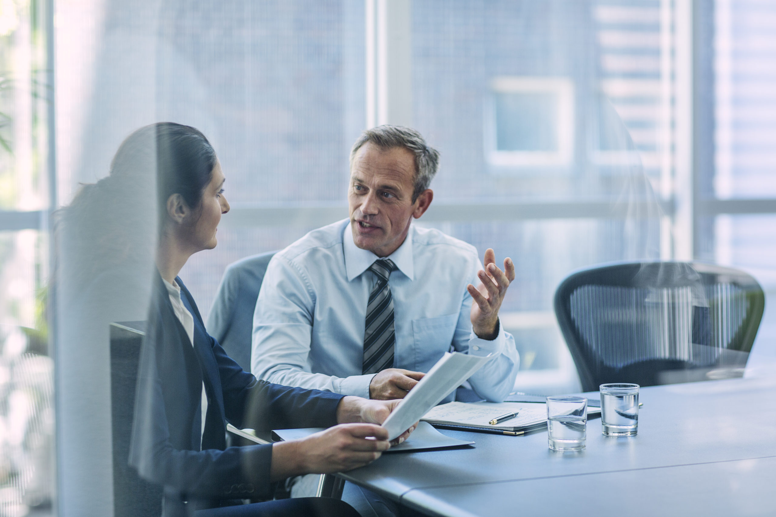 Businesspeople discussing strategy in office